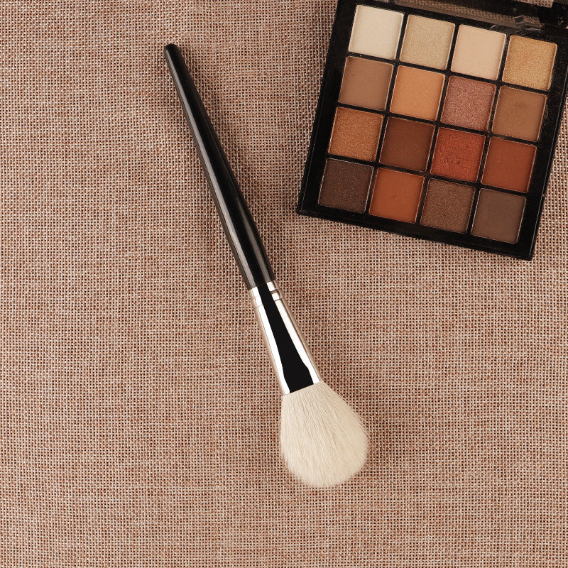 White powder blush brush