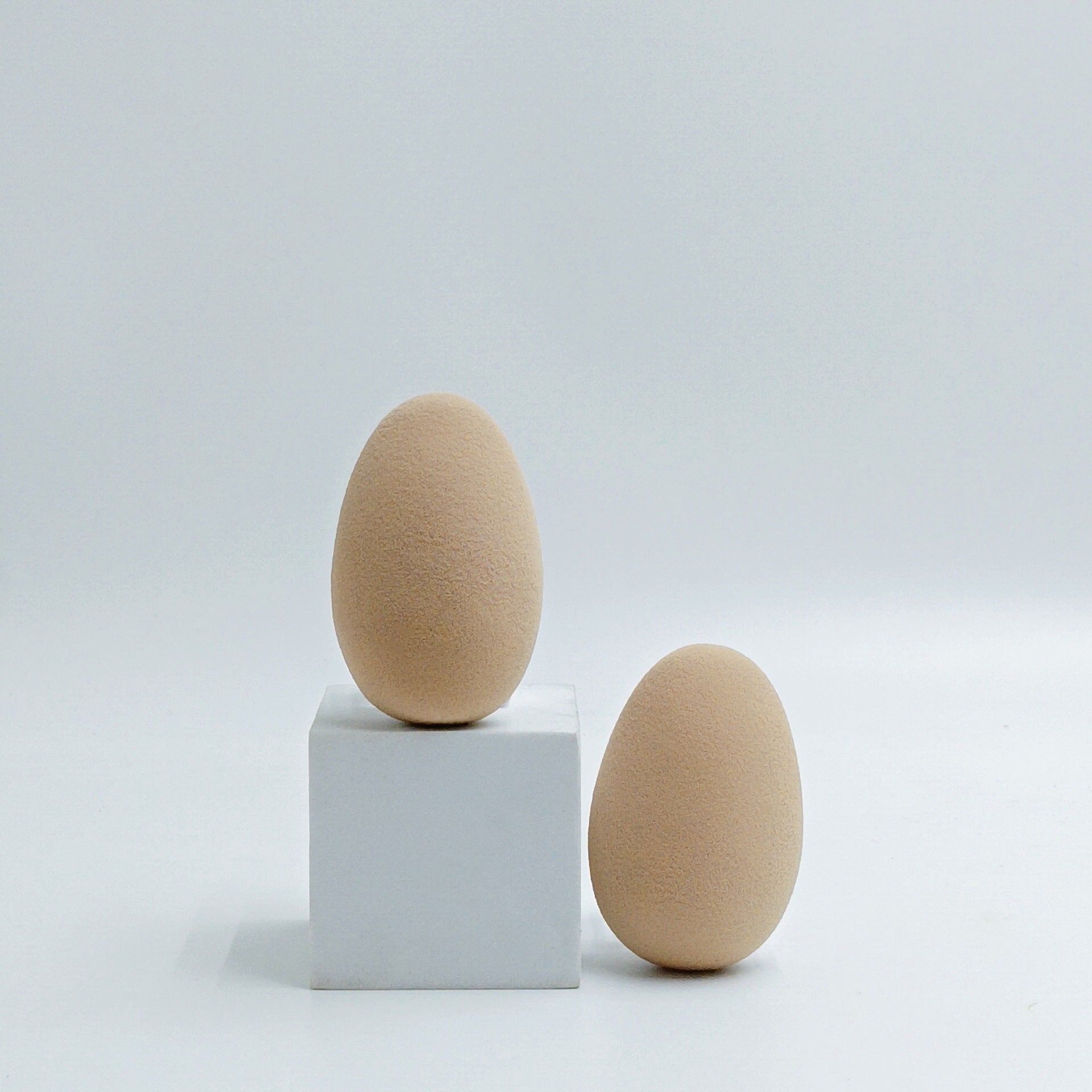 Oval-shaped makeup sponge that expands when soaked in water