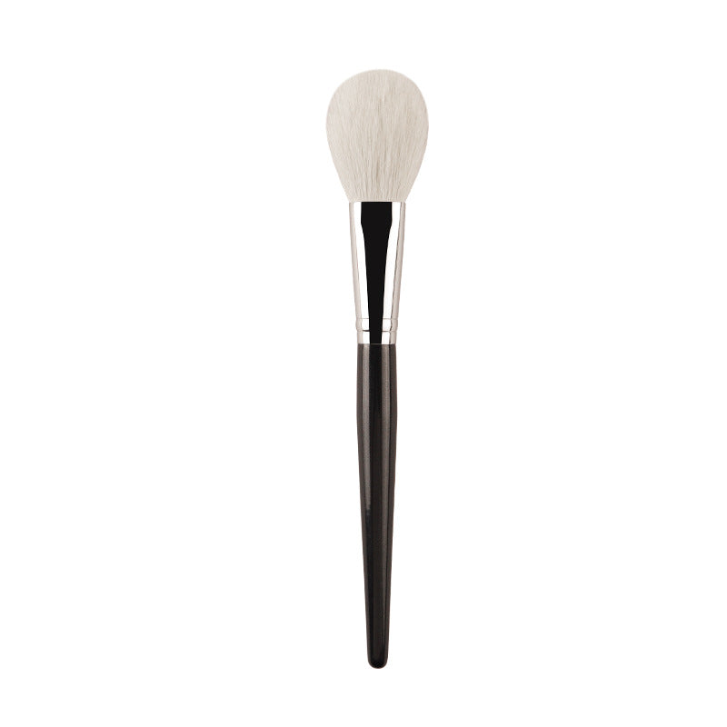 White powder blush brush
