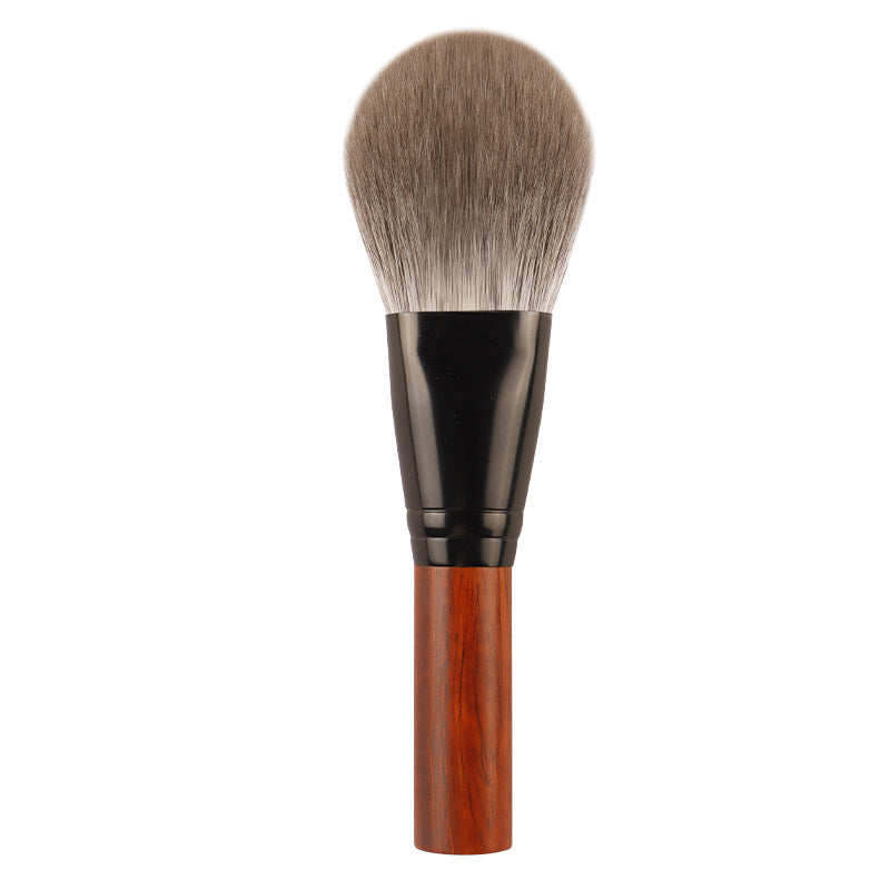 Flattened heart-shaped loose powder brush