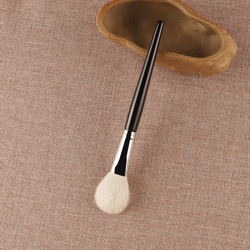 White powder blush brush